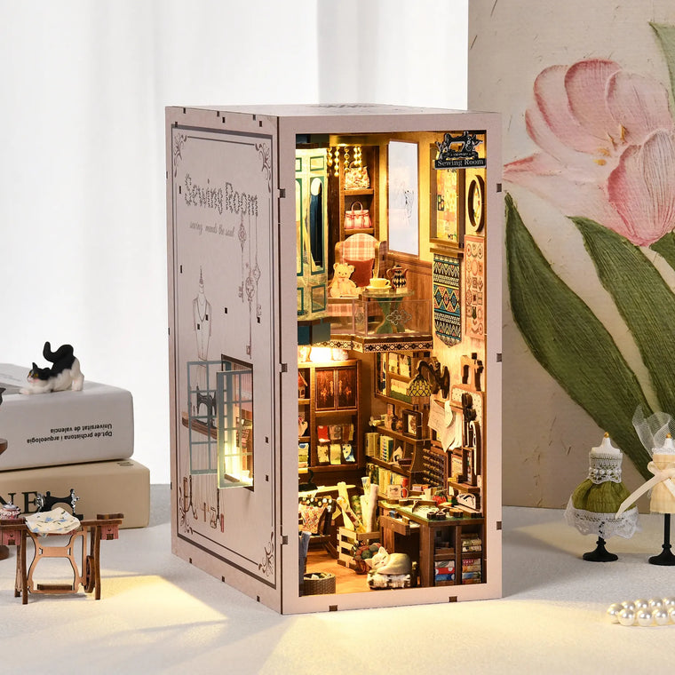 Sewing Room book nook kit – pink DIY miniature tailor's shop for a bookshelf